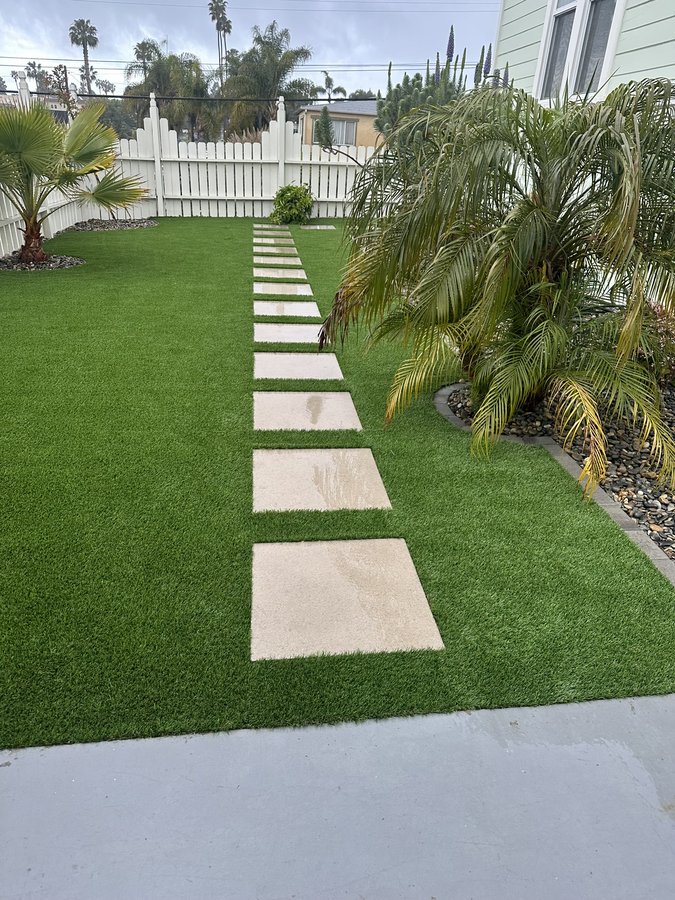 Front and back yard from dirt to design — Topcast concrete steppers, curbs and turf in front; Bermuda sod, broom finish concrete patio, irrigation and Keystone Legacy walls in back