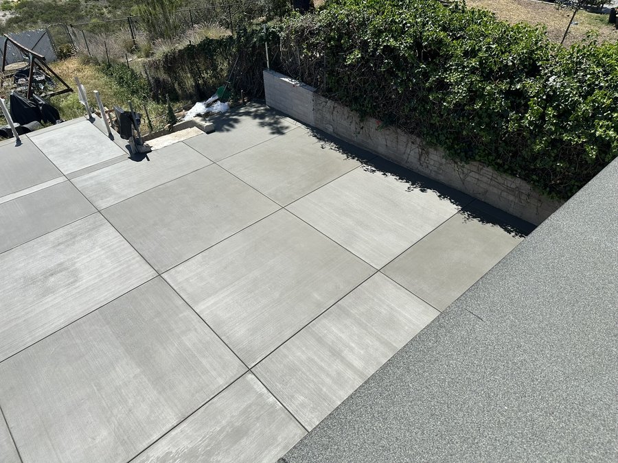 Two-tone checkerboard concrete patio