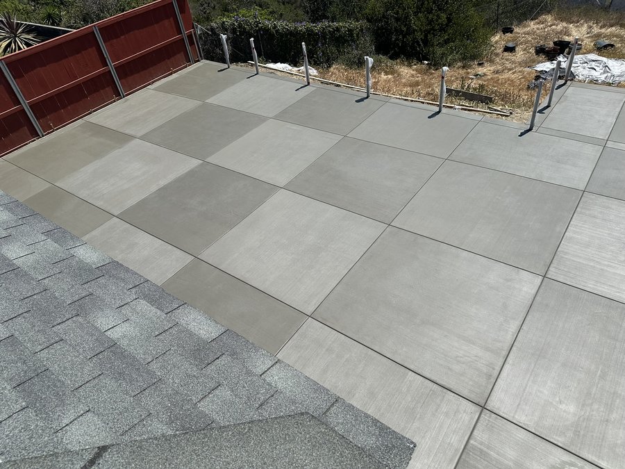 38 yards of silversmoke (carbon) colored concrete poured and broom finished for a carport in Julian, CA
