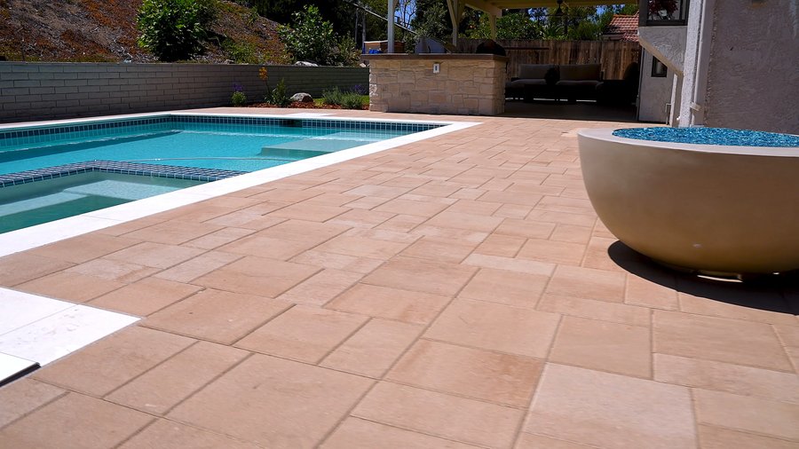 Fire pit bowl beside pool