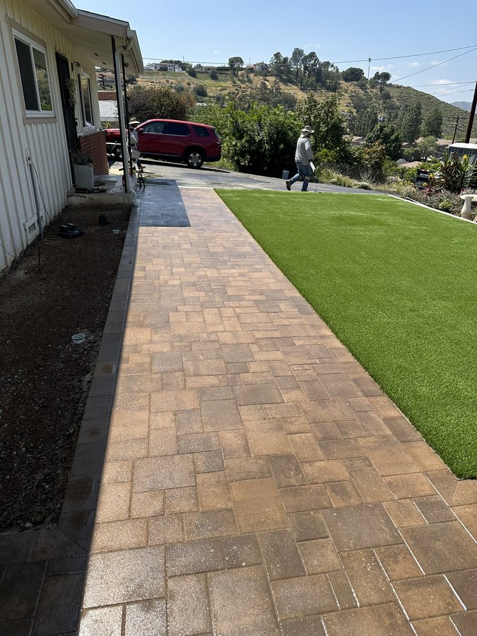 Corner paver patio with retaining wall