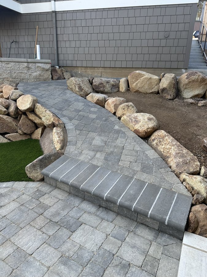 Paver patio with turf fire pit ring