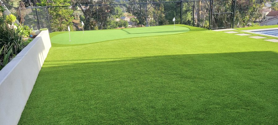 Putting-green style turf backyard